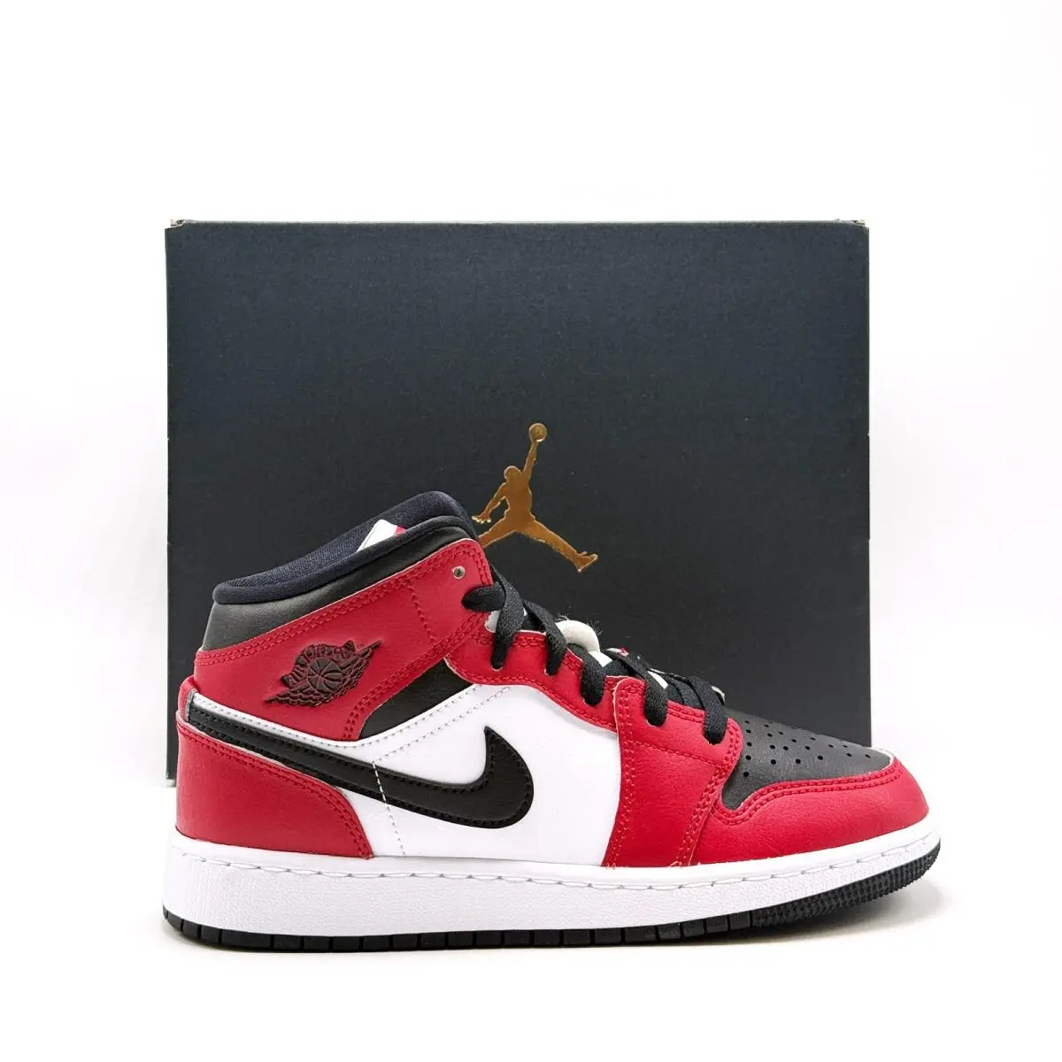 Big Kids` Air Jordan 1 Mid Shoes Black / Gym Red 554725 069