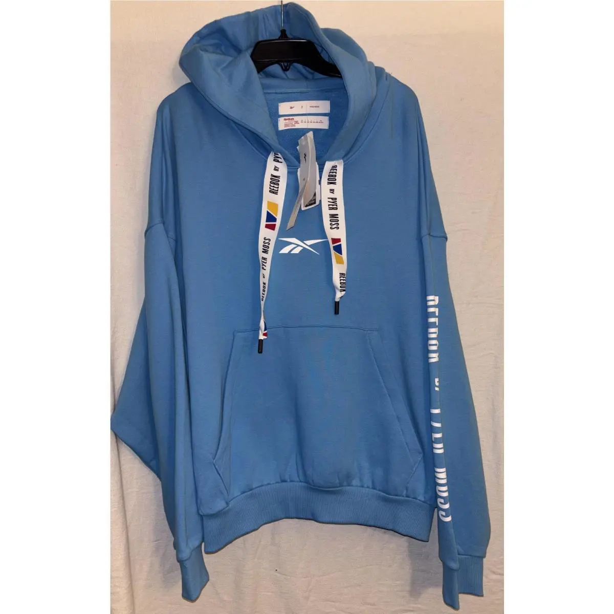 Reebok By Pyer Moss Hoodie Mens 2XL Blue Alwaysblu Fleece Graphic Logo Pullover