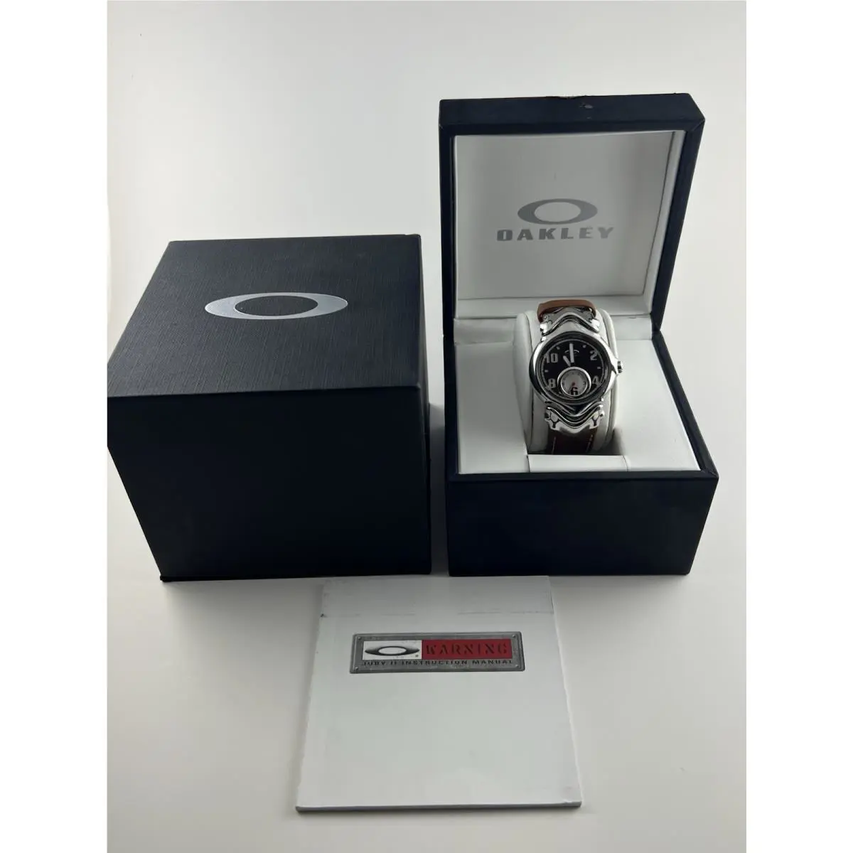 Jury II Watch Polished Stainless Steel Brown Leather Dial Judge by Oakley