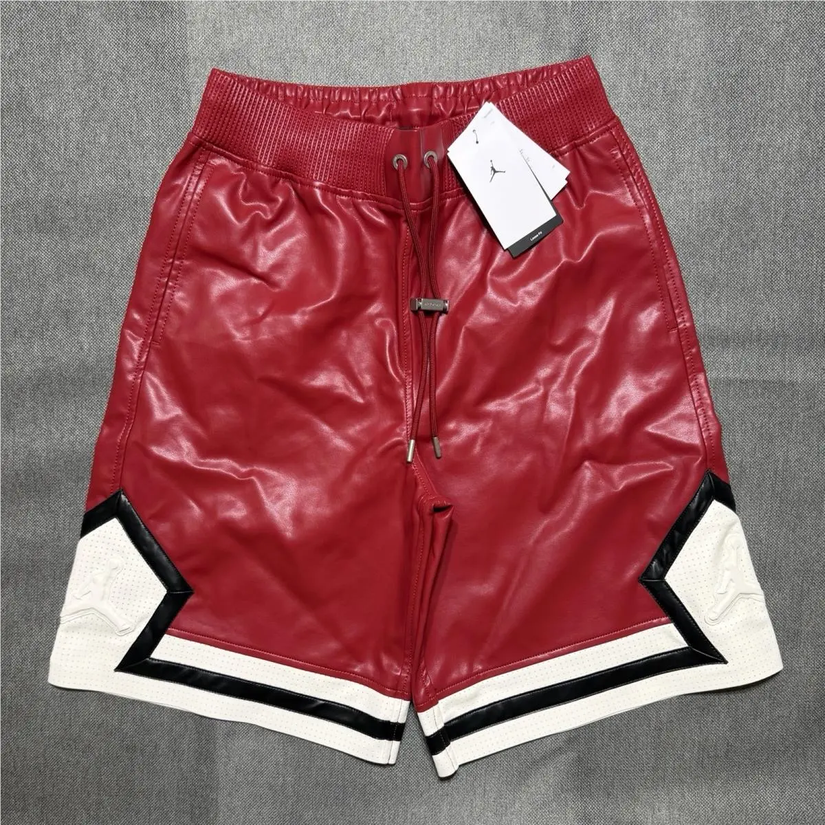 Nike clothing - Air Jordan Faux Leather Diamond Shorts - HV0077-659 - Wings Jordan Red (UPC: 198485234000) 0
