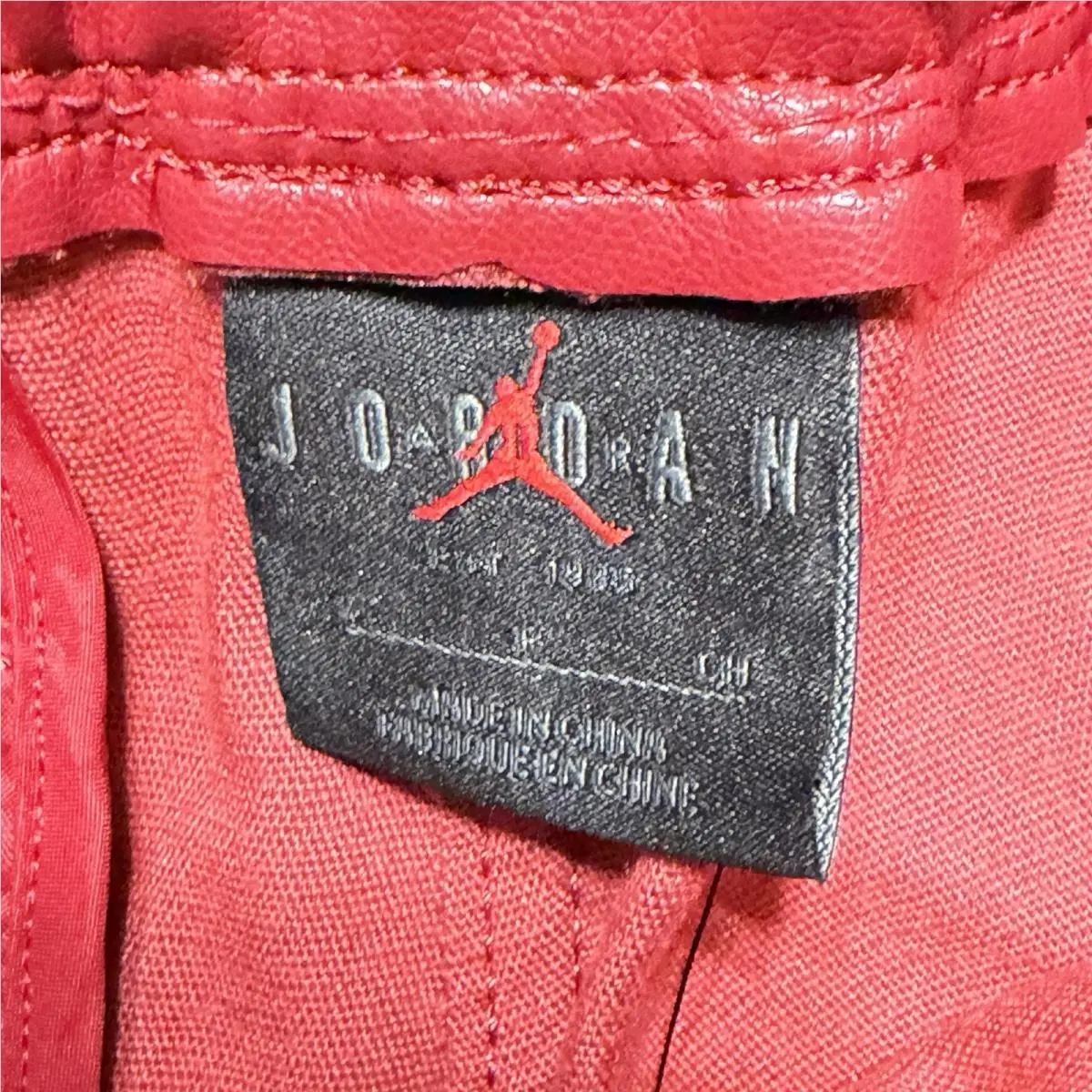 Nike clothing - Air Jordan Faux Leather Diamond Shorts - HV0077-659 - Wings Jordan Red (UPC: 198485234000) 5