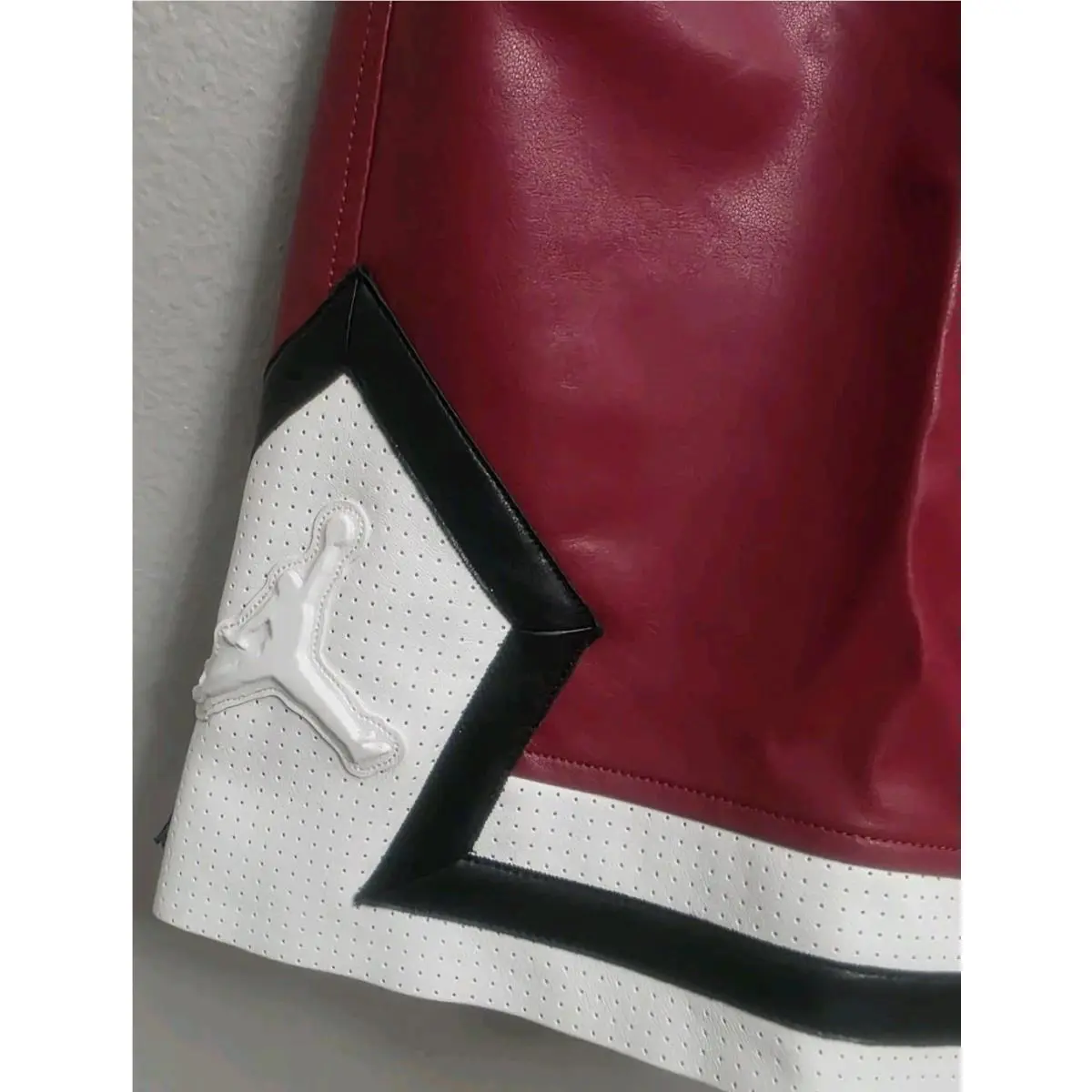 Nike clothing - Air Jordan Faux Leather Diamond Shorts - HV0077-659 - Wings Jordan Red (UPC: 198485197060) 2