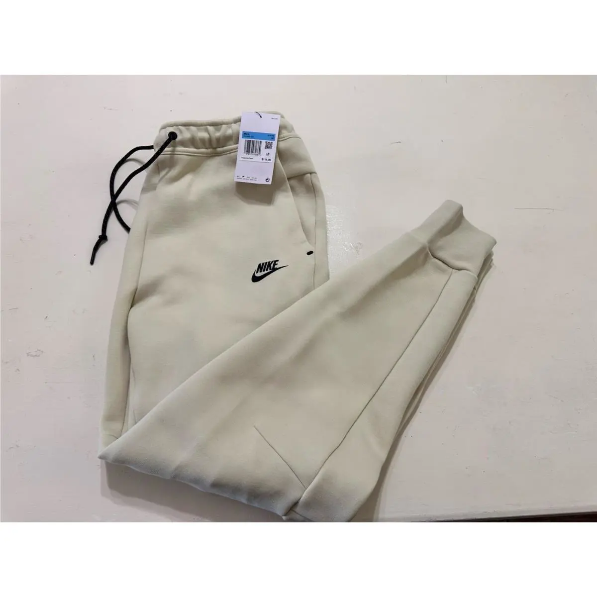 Men’s Nike Tech Fleece Slim Fit Taper Leg Cream Joggers Size M