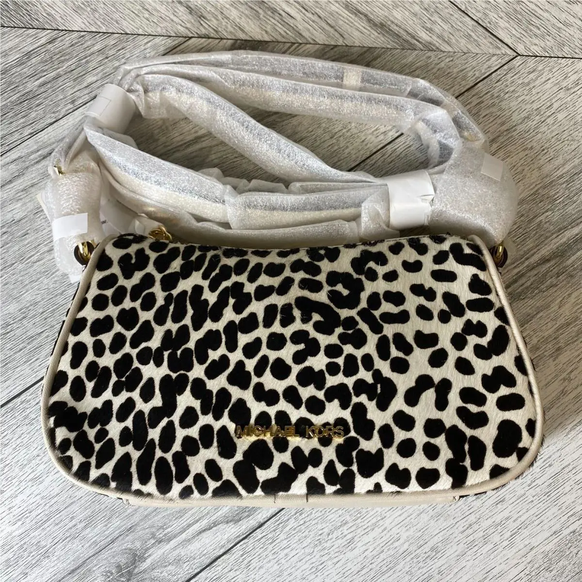 Michael Kors Light Cream Calfhair Dyed Carmela Pouchette Crossbody Bag Small