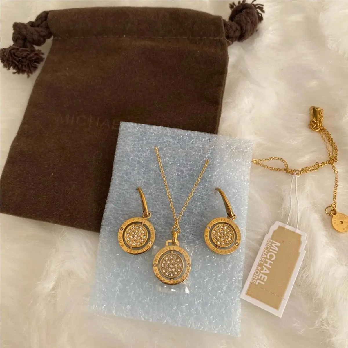 Michael Kors Gold Tone Crystal Pendant Necklace and Earrings Set