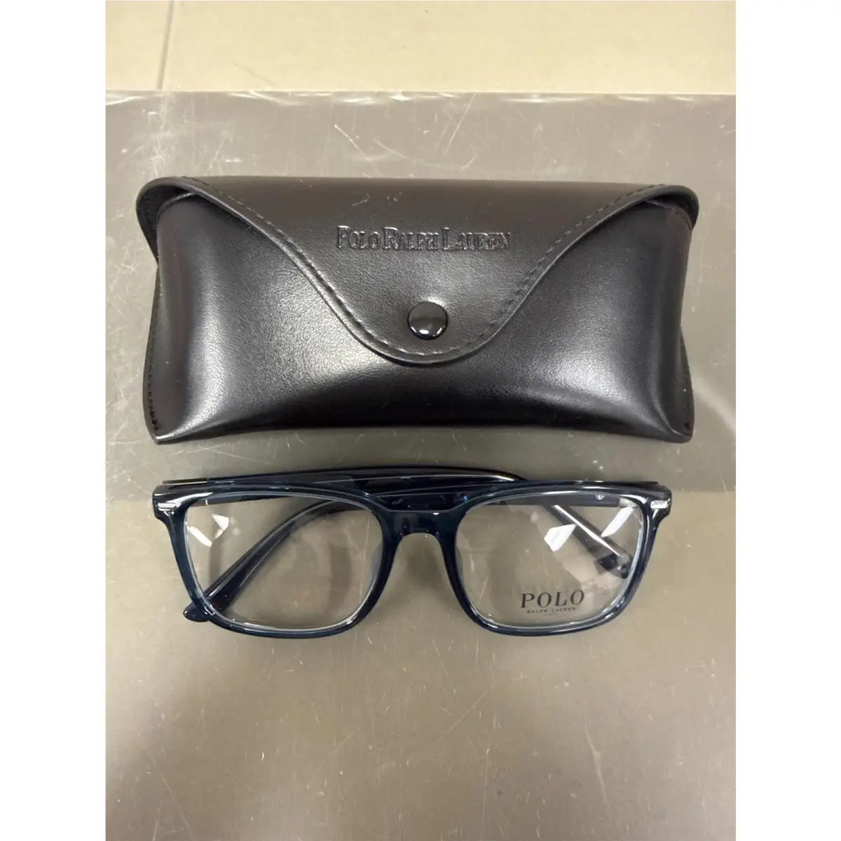 Polo Ralph Lauren 2271U 145/52-18 Shiny Transparent Blue. Demo Lens