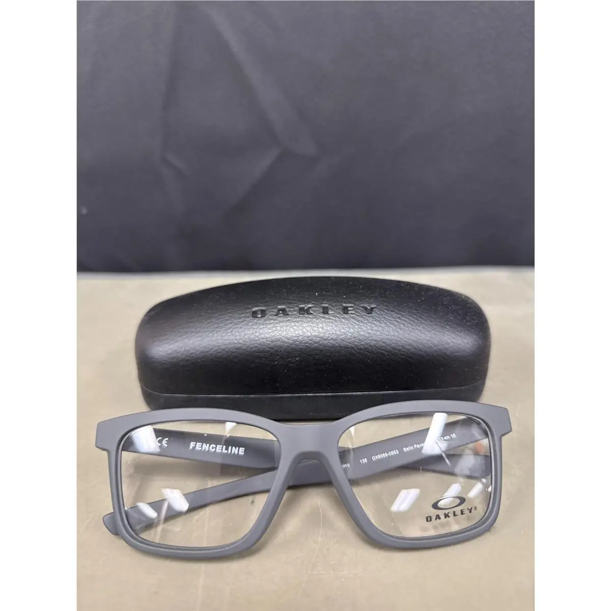 136 Satin Pavement 136/53-16 Demo Lens by Oakley