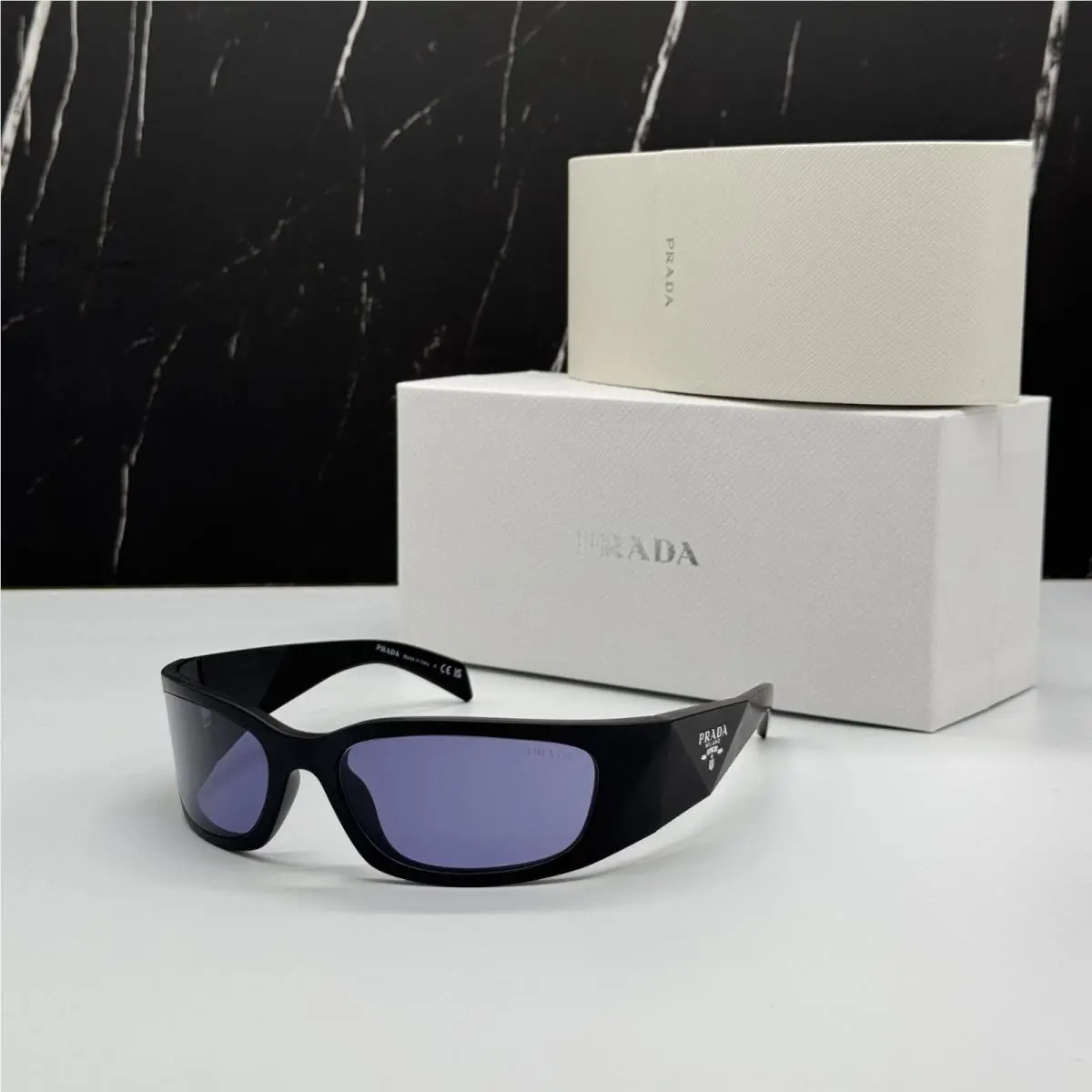 Prada PRA19S 1BO40G Sunglasses PR A19S 1BO40G Black/purple Unisex Spr A19S