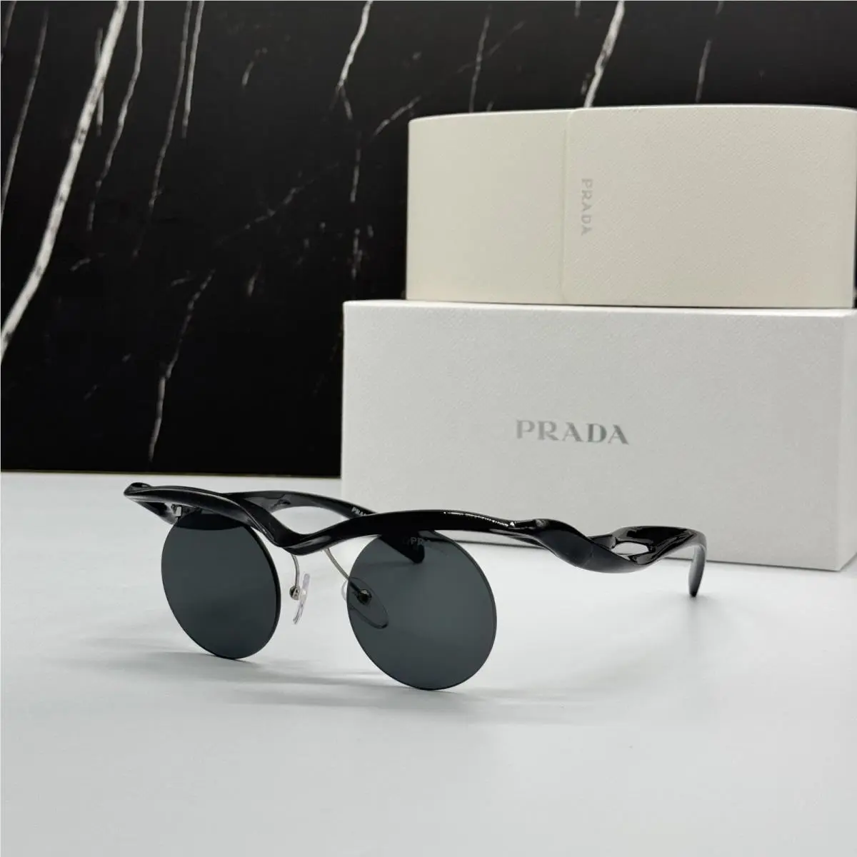 Prada PRA18S 1AB5S0 Sunglasses PR A18S 1AB5S0 Round Black Unisex Spr A18S