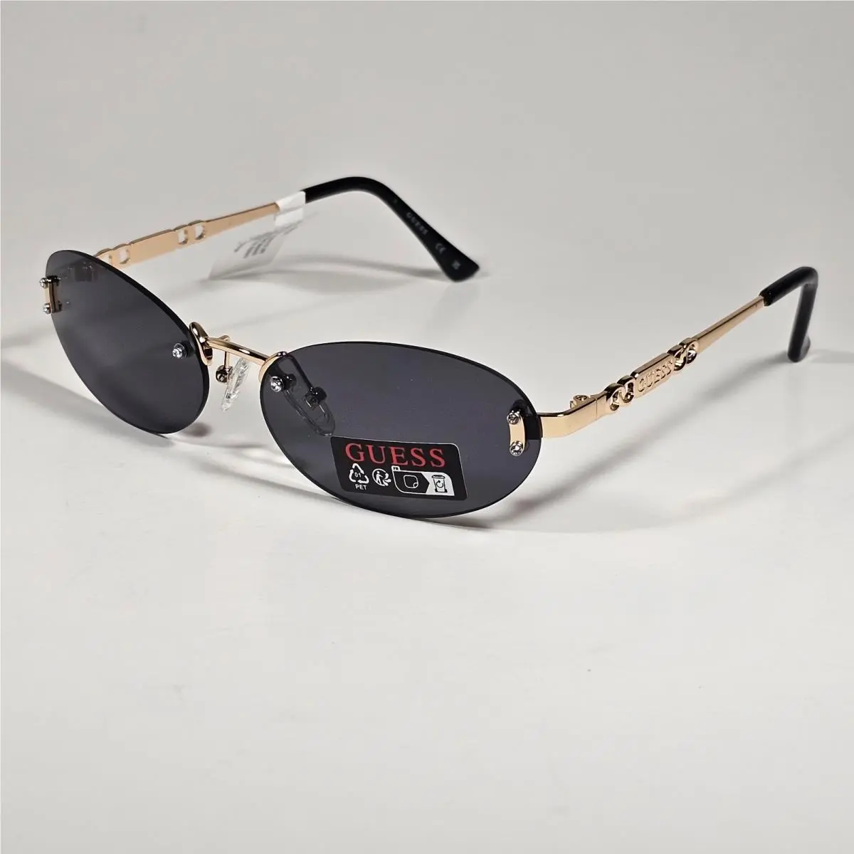 Guess GO00082 32A Small Rimless Oval Sunglasses Gold Frame Gray Tinted Lens