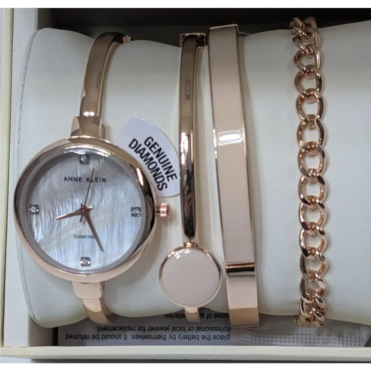 Anne Klein Women`s AK/5142BHST Pink Dial Bangle Watch and Bracelet Set