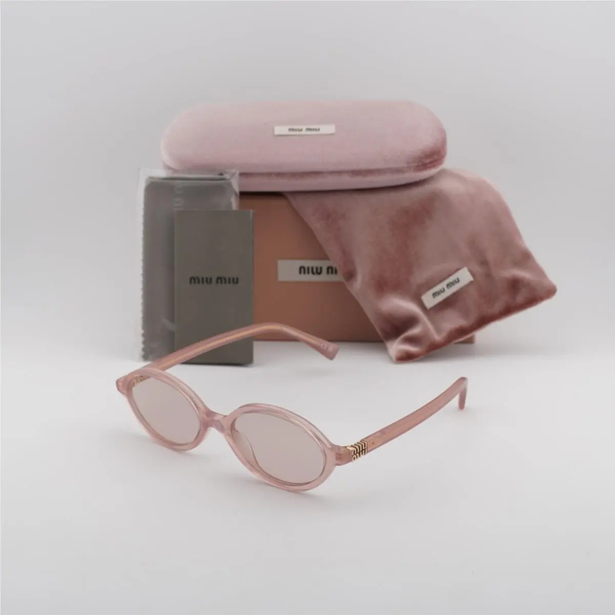 Miu Miu MU04ZS 20I60V Opaline Pink/pink 50-18-140 Sunglasses