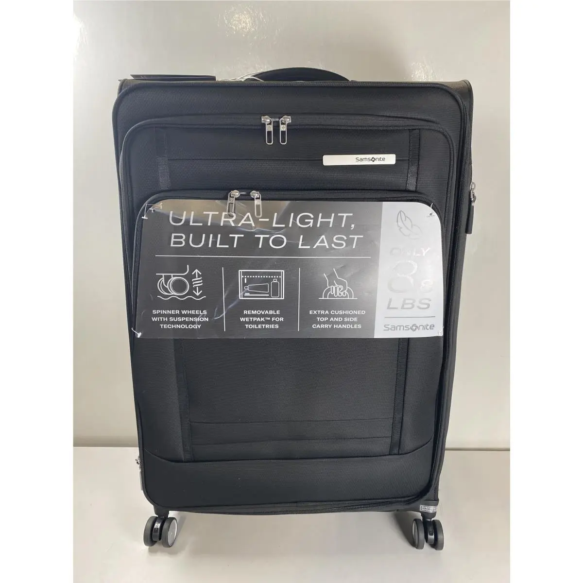 Samsonite Uplift Softside Large Expandable Rolling Spinner Suitcase in Black