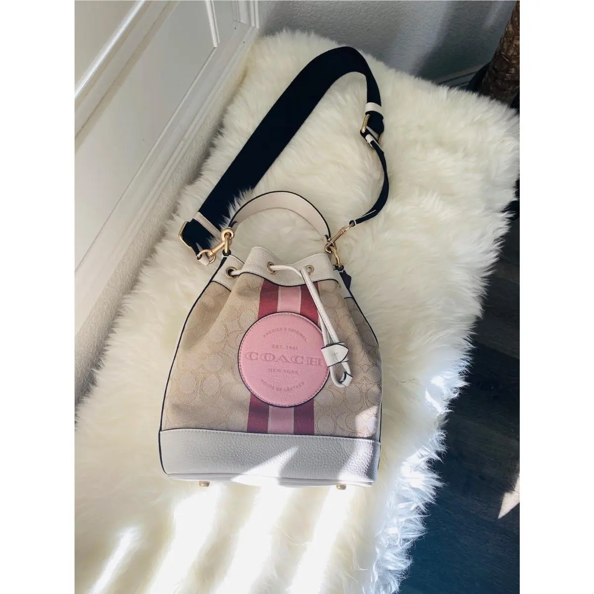 Coach Dempsey Drawstring Bucket Crossbody Bag In Sig Jacquard Pink