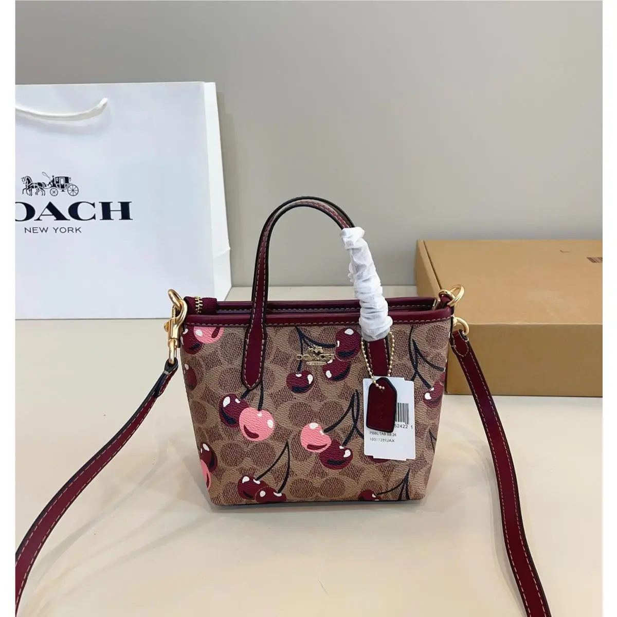 X Peanuts City Mini Tote Bag Signature Coated Canvas Cherry Outlet by Coach