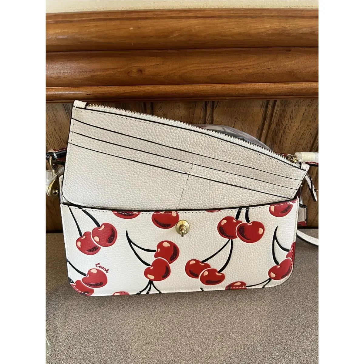 Coach Noa Pop up Messenger Cherry Print Leather Brass Chalk CA799