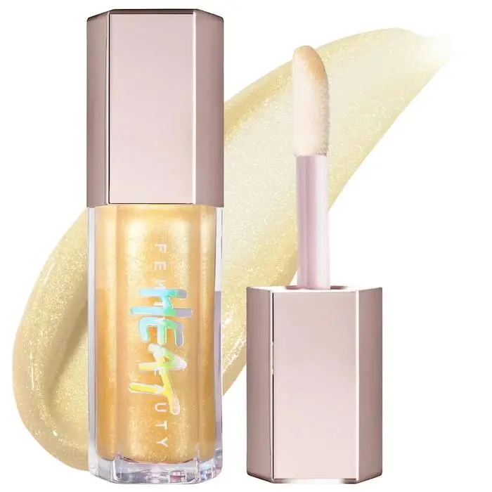 Gloss Bomb Heat Lip Luminizer + Plumper Lemon Lava - clear with gold shimmer by Fenty Beauty