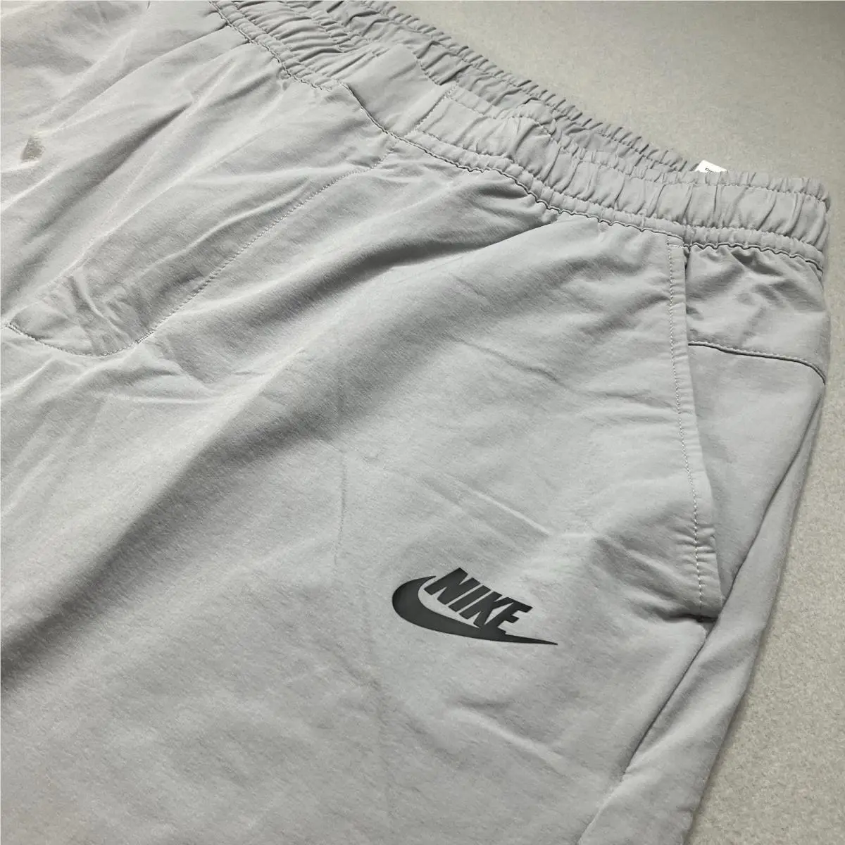 Nike clothing - Nike Sportswear Woven Tapered Commuter Pants - DM6621 DM6621-012 - Gray (UPC: 195868498875) 2