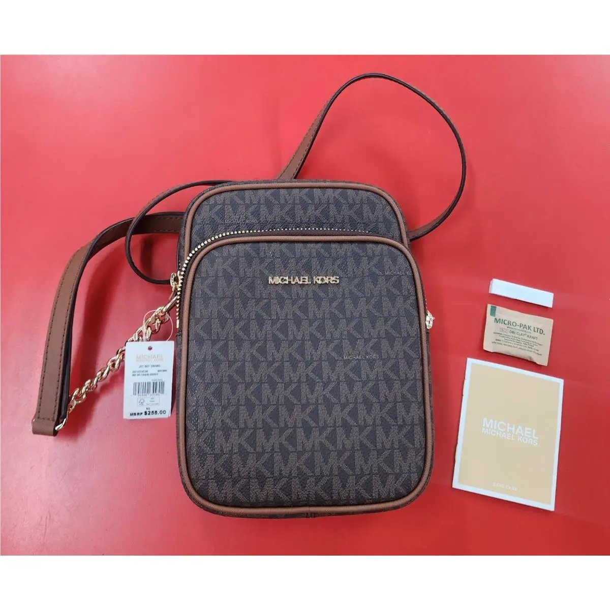 Michael Kors Jet Set Travel MK Logo Pvc Leather Medium Flight Crossbody Bag
