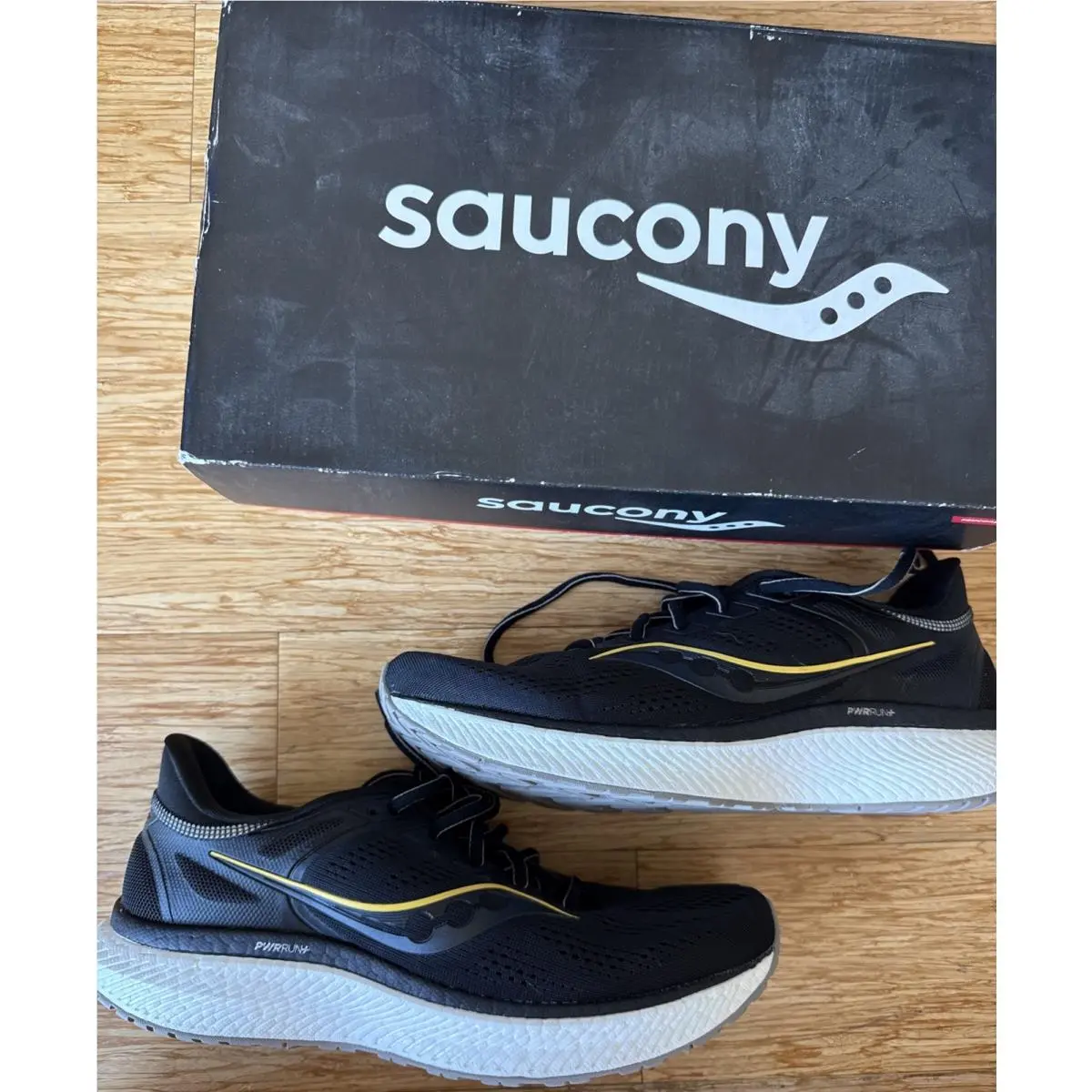 Saucony Men`s Hurricane 23 Running Shoe Black/gold Size US 10