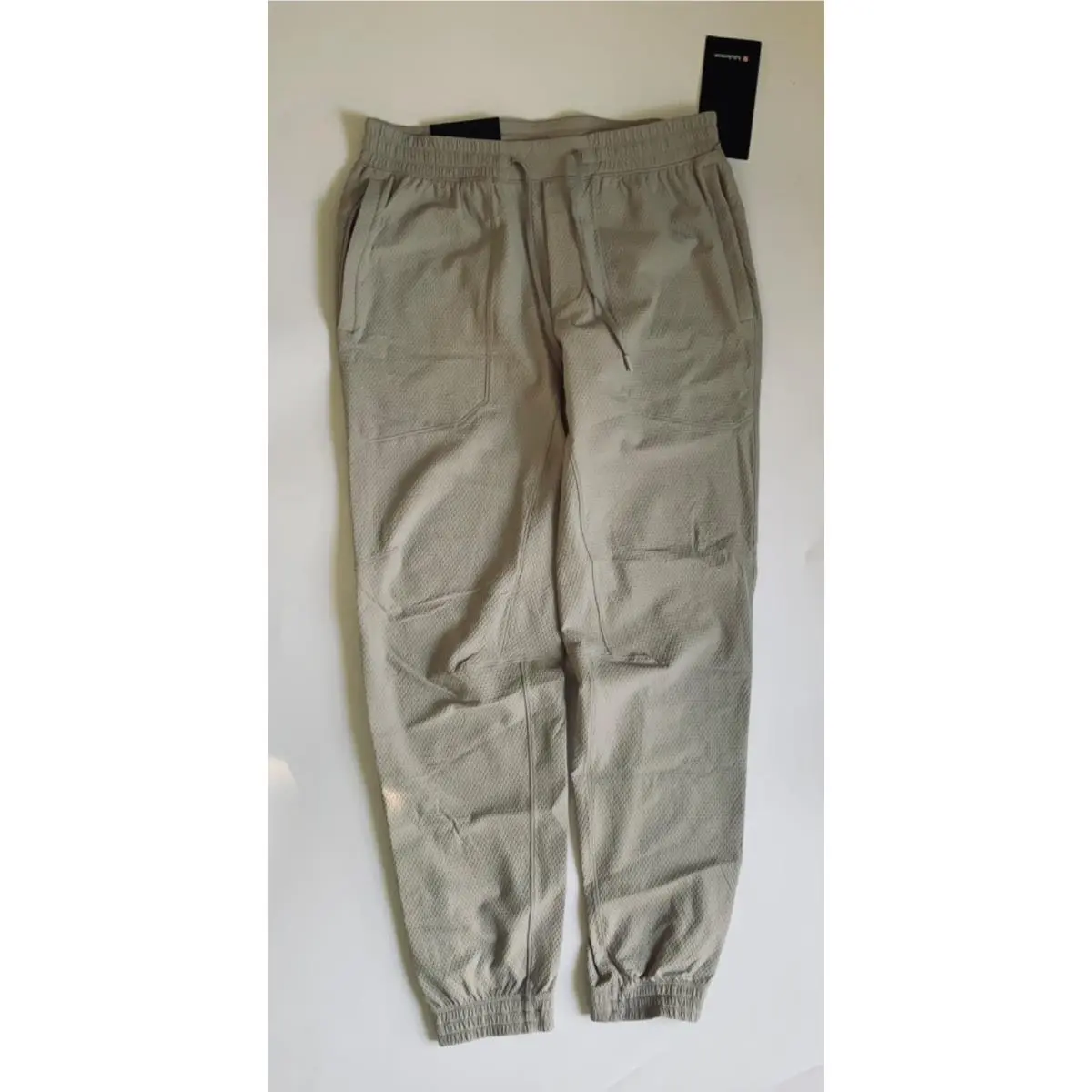 Lululemon Men’s License To Train Textured Jogger Pants LM5BFGS Beige Size M Reg