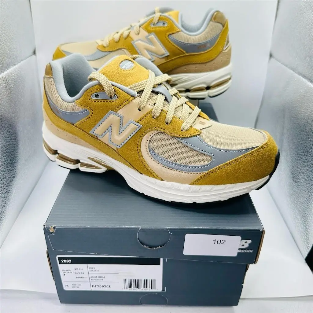 New Balance 2002R Youth Sneakers Beige Tan Yellow Gray Size 7Y / Women’s 8.5