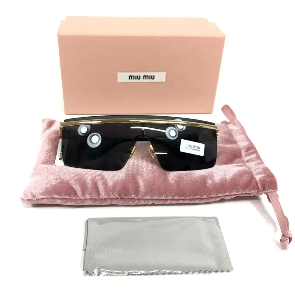 Sunglasses SMU50Z 5AK-5S0 Polished Gold Frames w/ Dark Grey Shield Lens by Miu Miu
