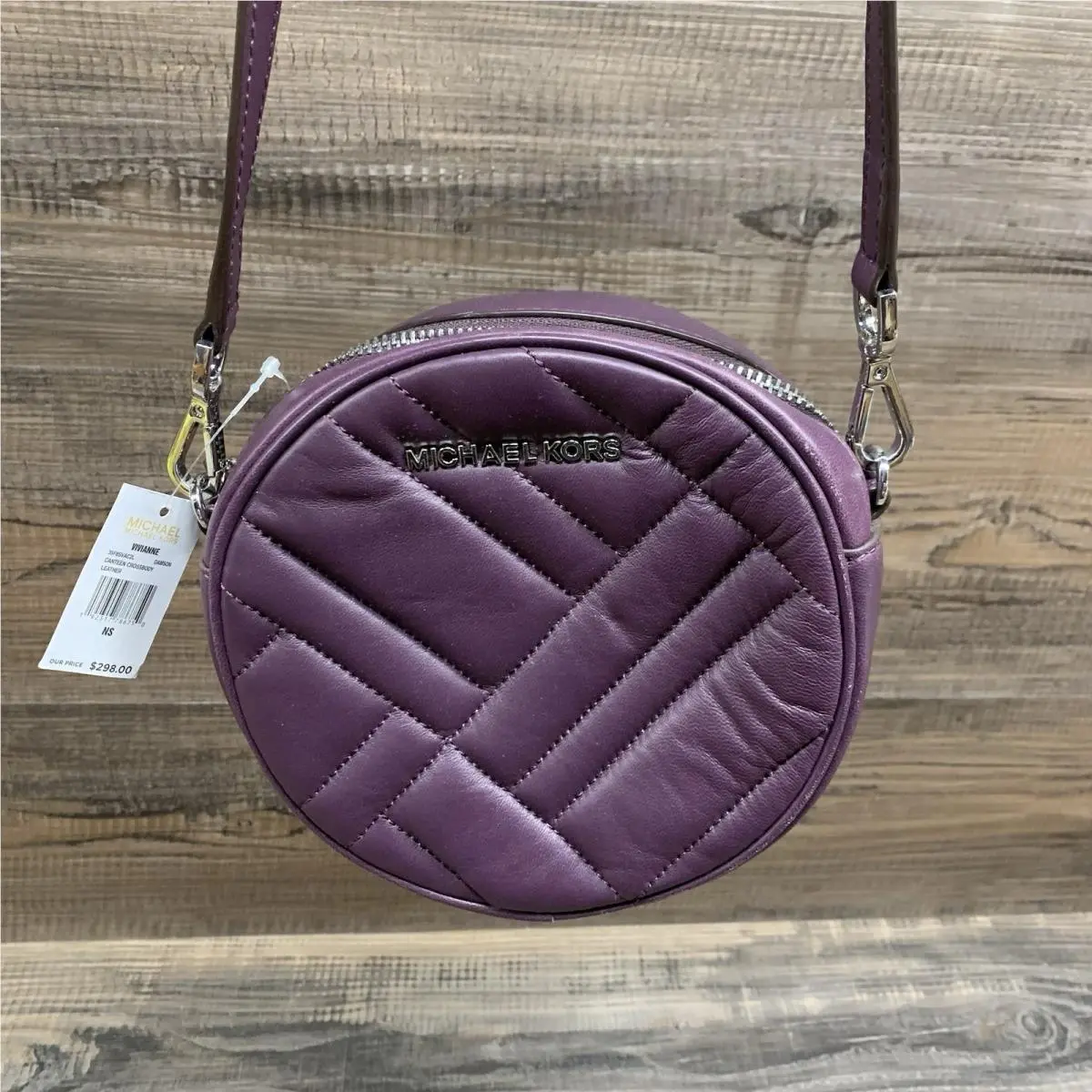Michael Kors Damson Quilted Leather Vivianne Canteen Round Crossbody Bag 6”