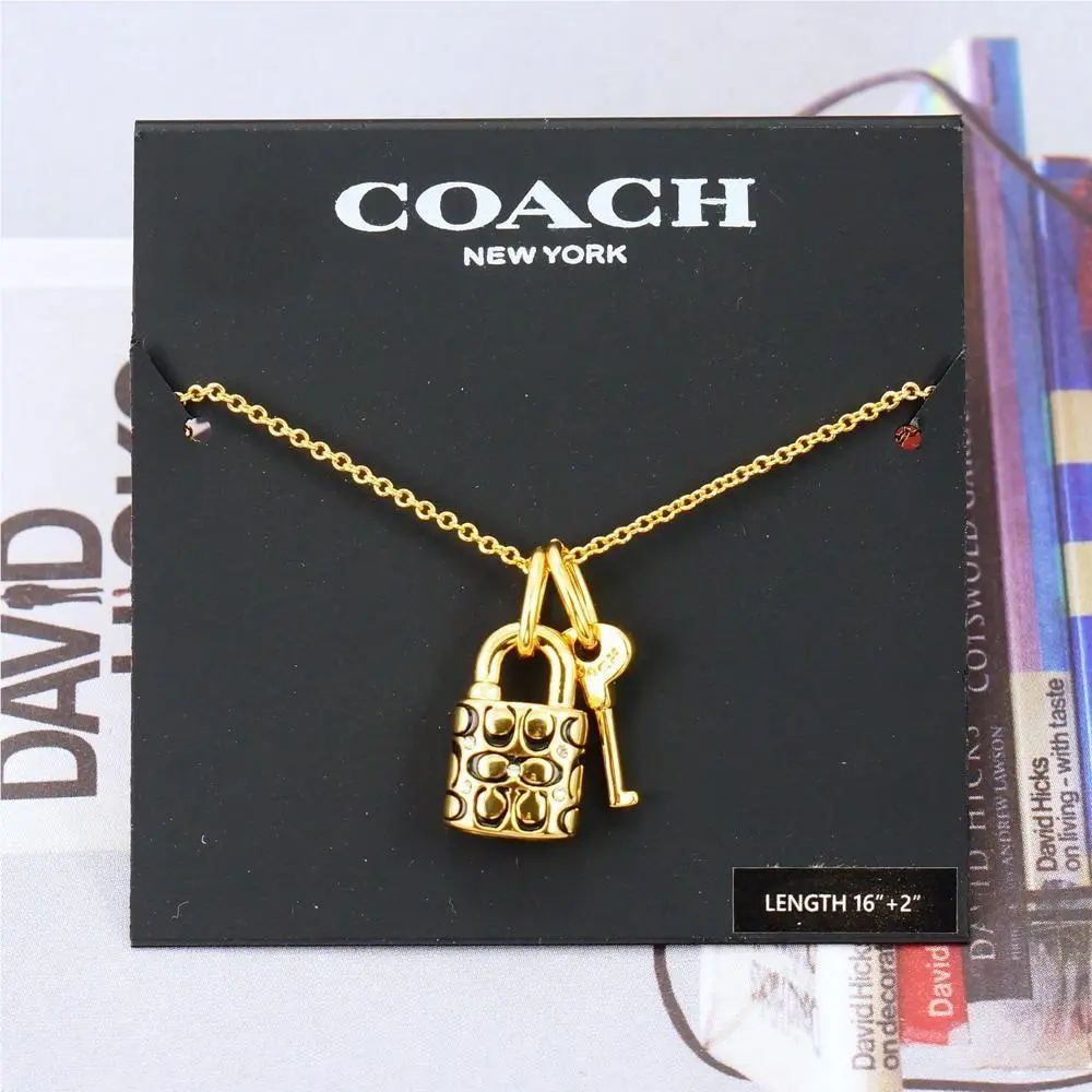 Coach Signature Padlock Black Enamel Necklace Gold Tone