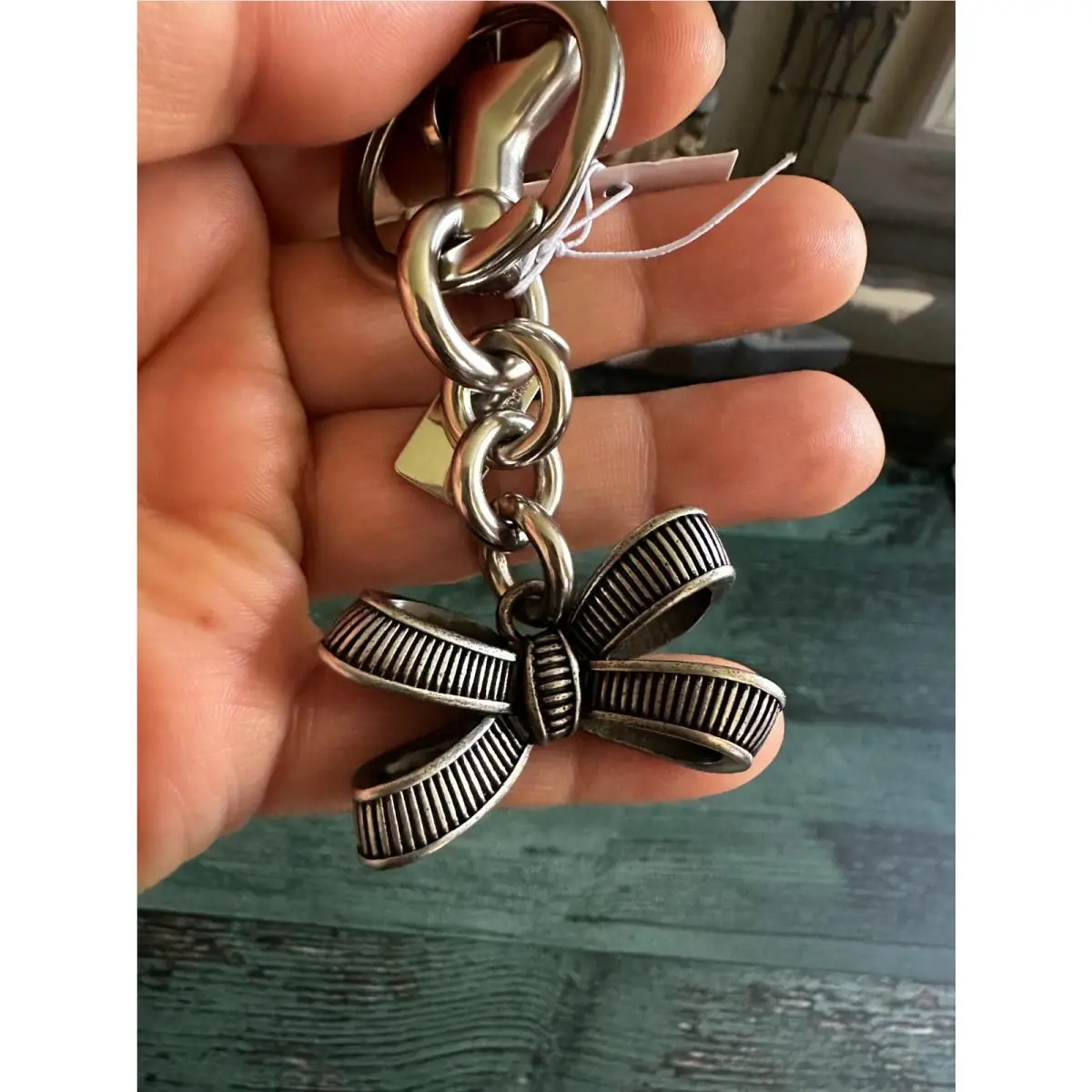 Coach CEM83 Bow Bag Charm Silver CEM83 with Dust Bag