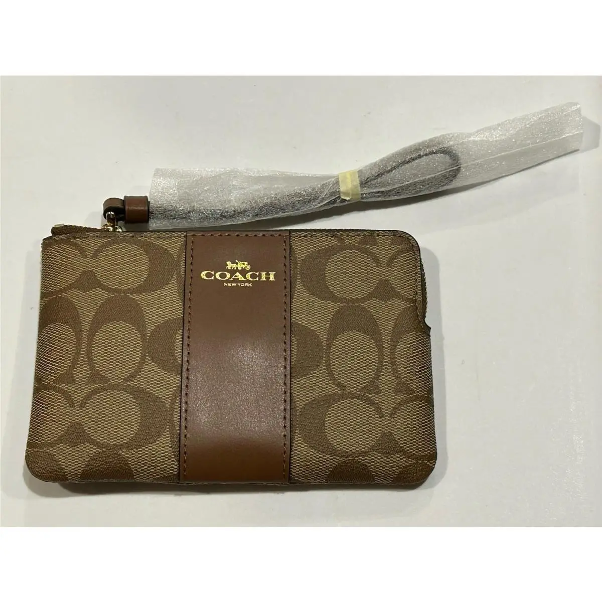 Coach Corner Zip Wristlet In Signature Canvas Khaki Saddle Retail