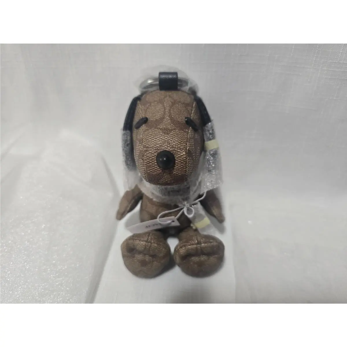 In Package  X Peanuts Snoopy Collectible Bag Charm Leather by Coach