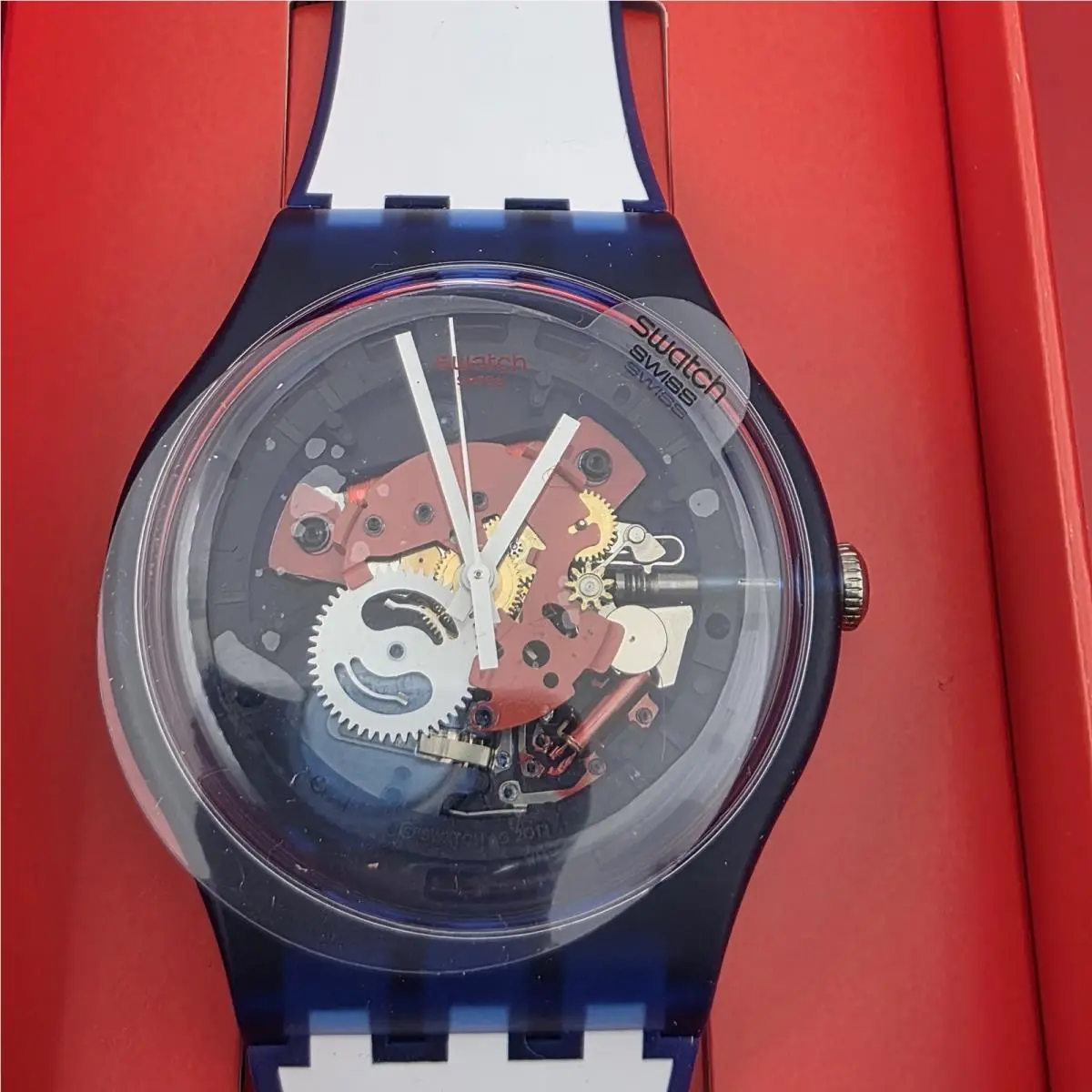 Swatch Swiss Clownfish Blue Skeleton Dial White and Blue Watch SUON112 Rever