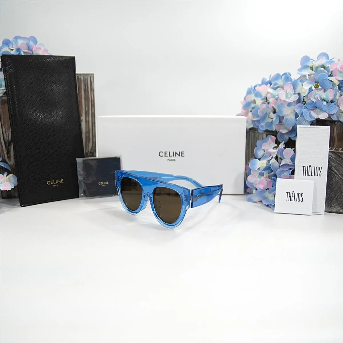 CL40012F Blue Transparent Acrylic Round Logo Sunglasses Case by Celine