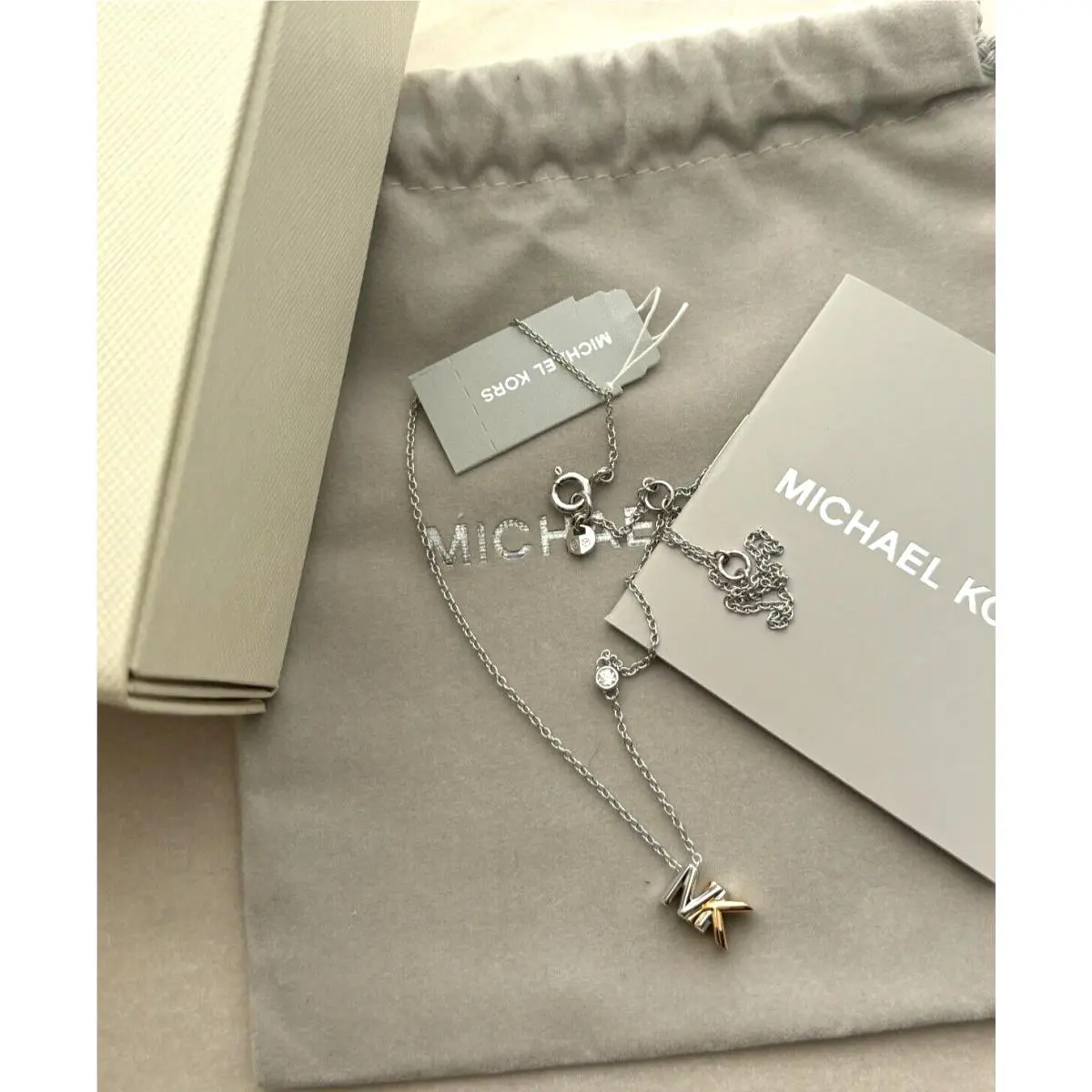 Two-tone Sterling Silver Cubic Zirconia Layered Logo Pendant by Michael Kors