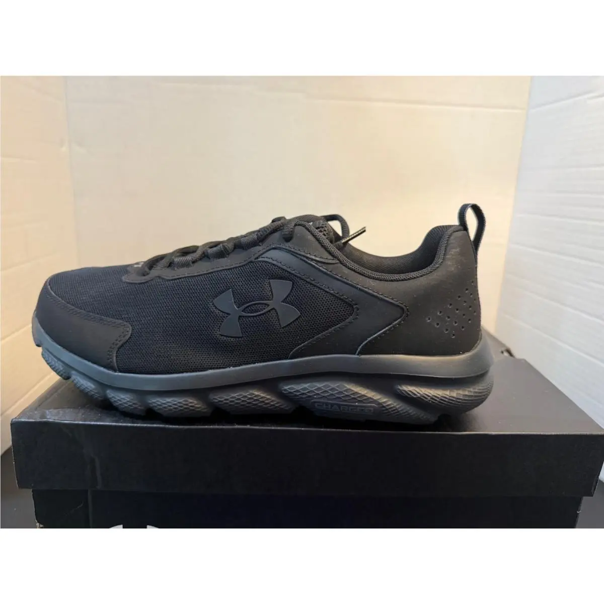 Size 10.5 - Under Armour Charged Assert 4E Wide Triple Black