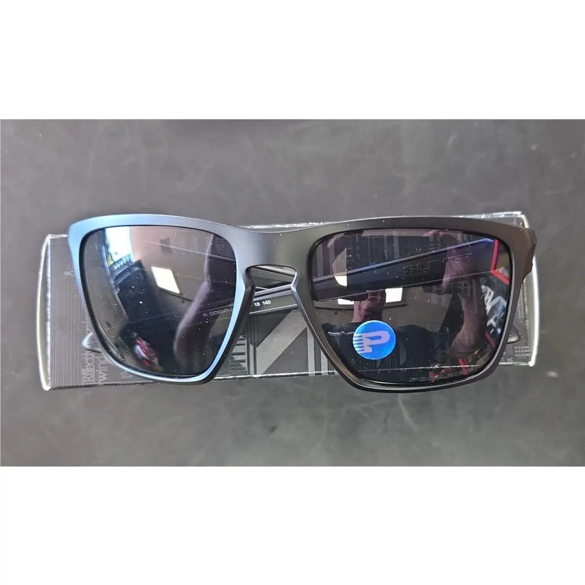 Oakley Silver XL Matte Black Lens Grey Polarized OO9341-04