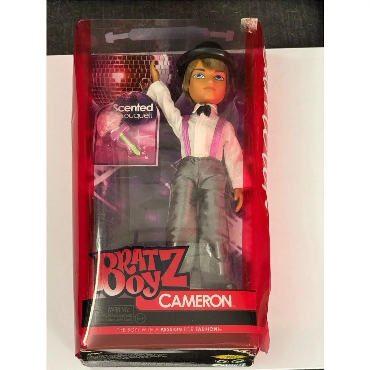 Bratz 20th Anniversary Cameron Boy Fashion Doll with Scented Bouquet BB21