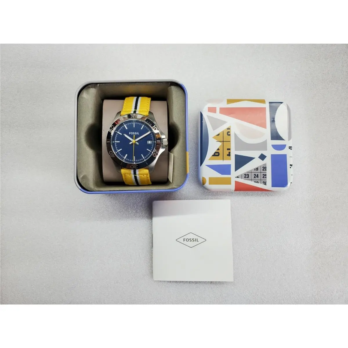 Fossil Retro Blue Dial Date Multi-color Nylon Strap Men`s Watch AM4477