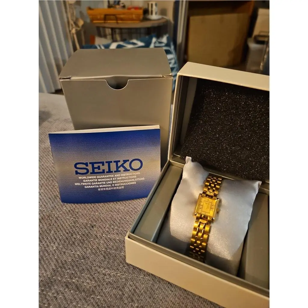 Seiko Gold-tone Women`s Wristwatch and Papers