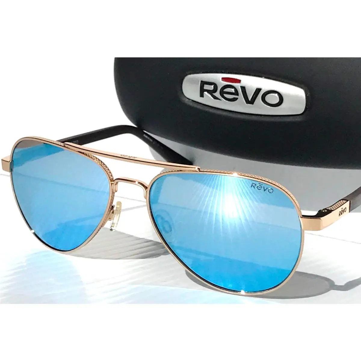 Revo Raconteur Shiny Gold Polarized Blue Water Lens Sunglass RE 1011 04 BL