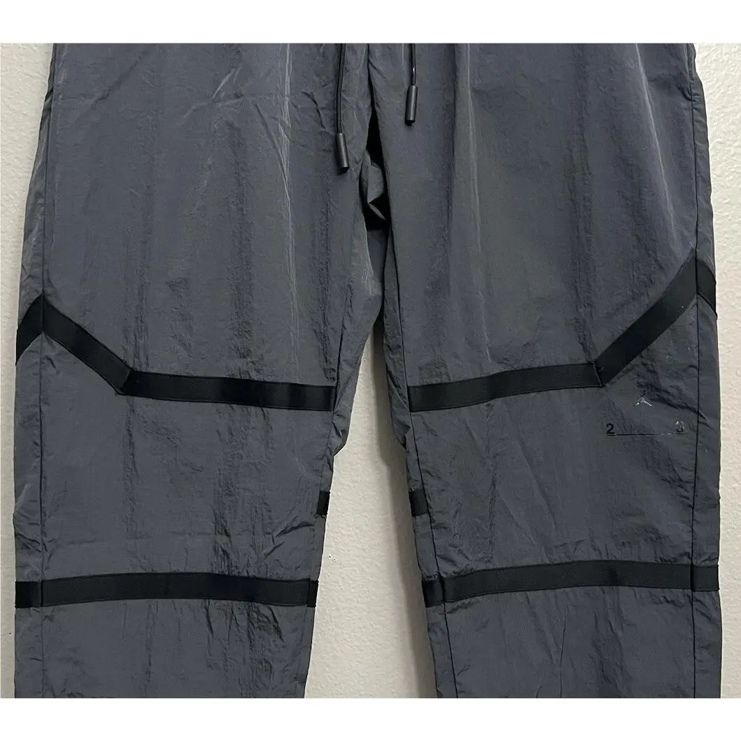 Nike clothing - Nike Air Jordan 23 Engineered Woven Pants - DV7699-022 - Atmosphere Grey (UPC: 196155381344) 1