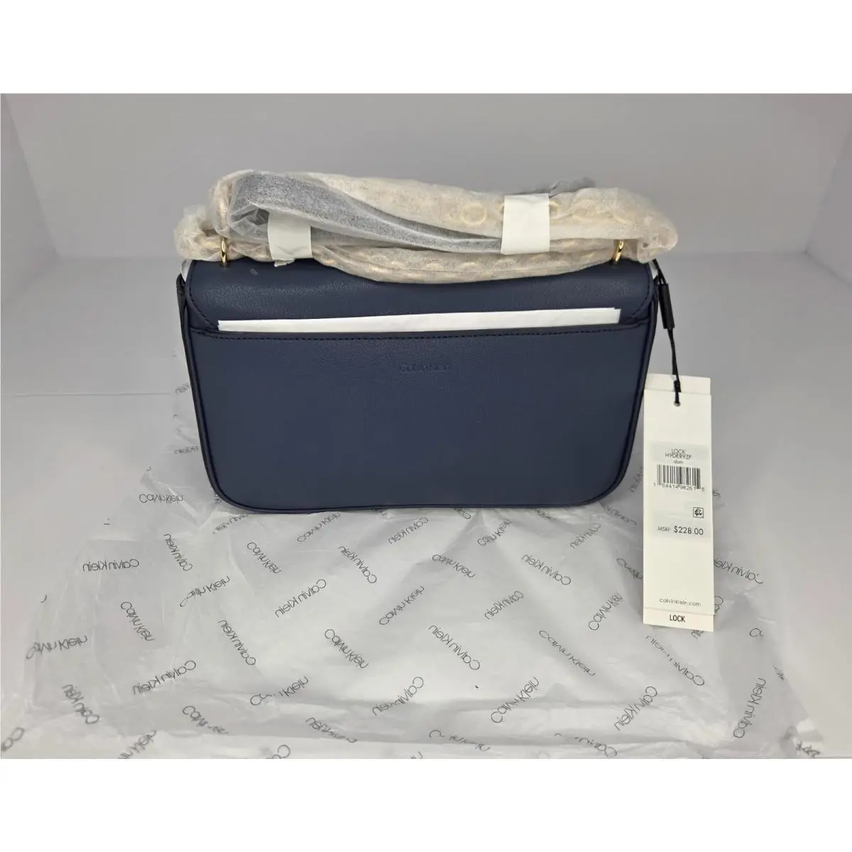 Calvin Klein Statement Lock Daytonna Leather Bag Dark Storm Crossbody Clutch