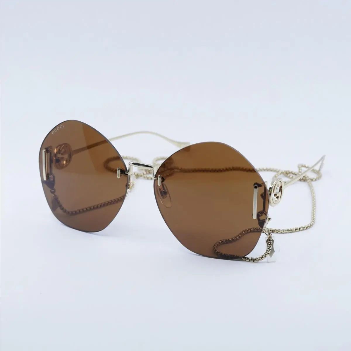 Gucci GG1203S 003 Gold/brown with Gold Chain 65-16-140 Sunglasses