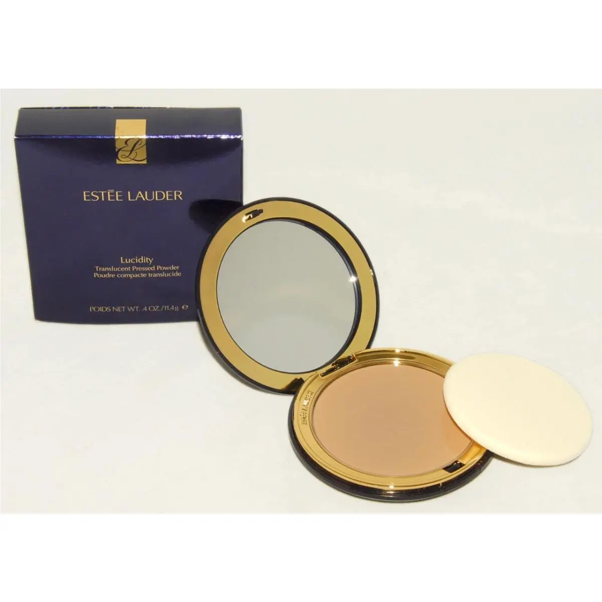 Estee Lauder Lucidity Pressed Powder 04 Medium Deep .4 oz