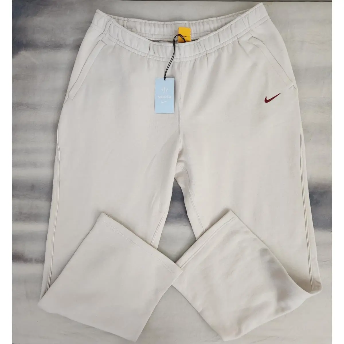 Nike Nocta Fleece CS Open Hem Pants Light Orewood Brown FZ4675 104 Men`s 2XL