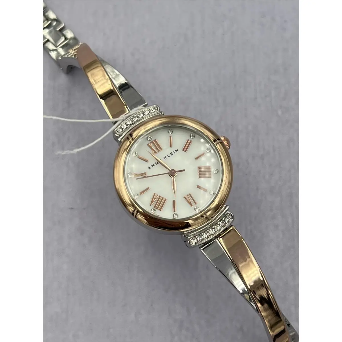 AK/2245G Women`s Diamond Accented Mop Dial Analog Bracelet Watch by Anne Klein
