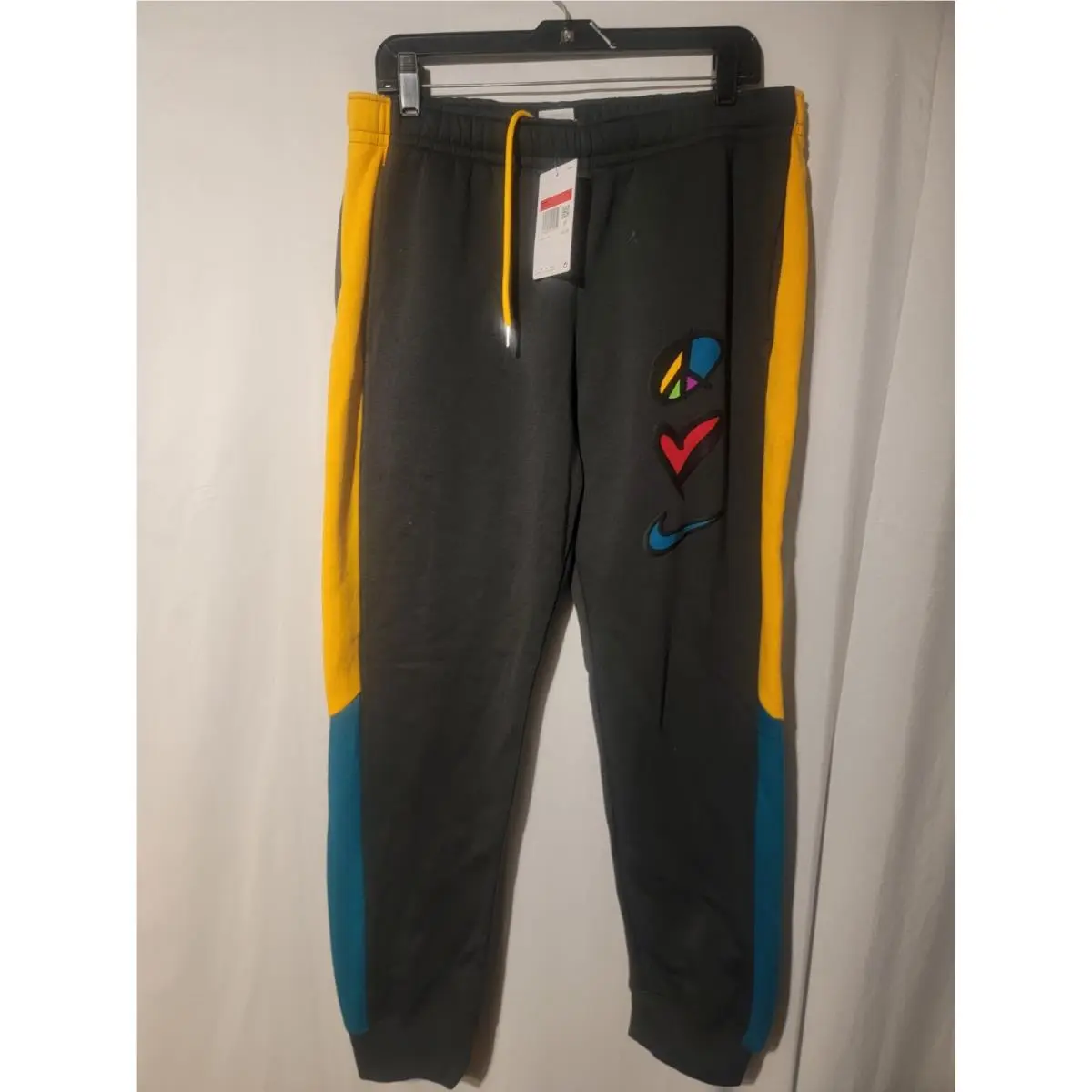 Nike Sportswear Men`s Large Fleece Jogger Sweatpants Peace Love Gray DO6182-045