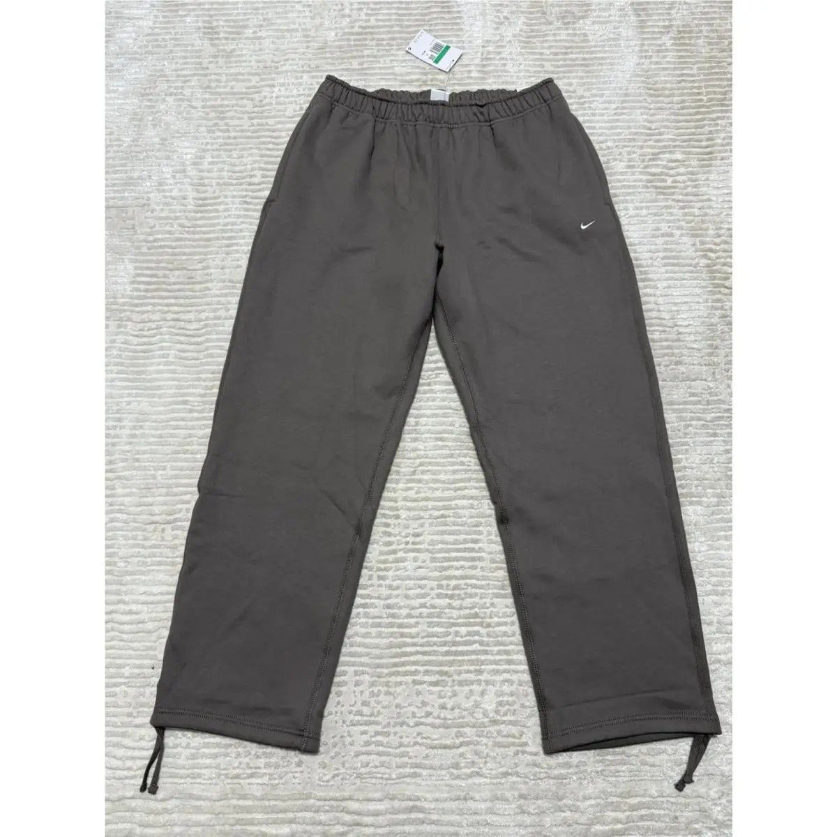 Solo Swoosh Open Hem Fleece Pants Cave Stone - XL by Nike
