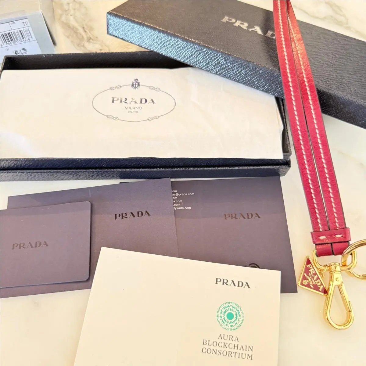 Prada Trick Pelle Leather Lanyard Keychain Rubino Red 1TL523 Gold Hardware